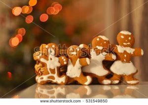 stock-photo-lovely-ginger-cookies-family-with-blurred-background-of-new-year-tree-531549850